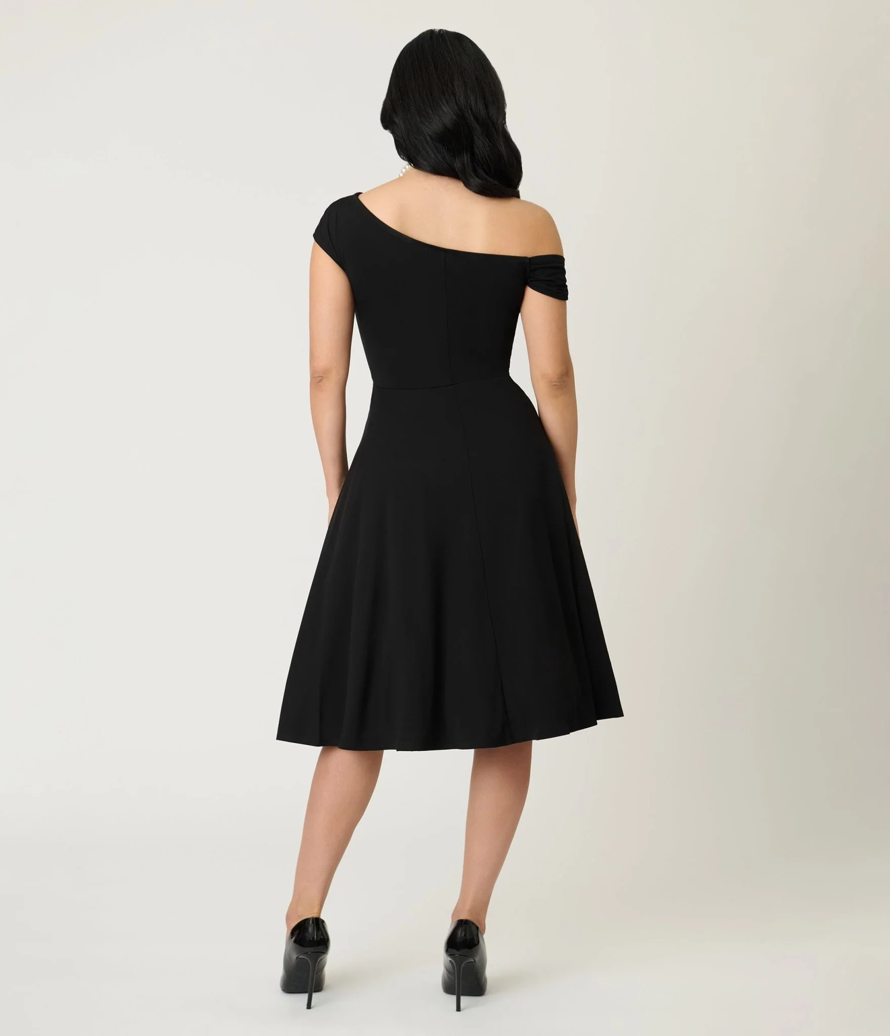 Unique Vintage Black Asymmetrical Neck Swing Dress - Image 2